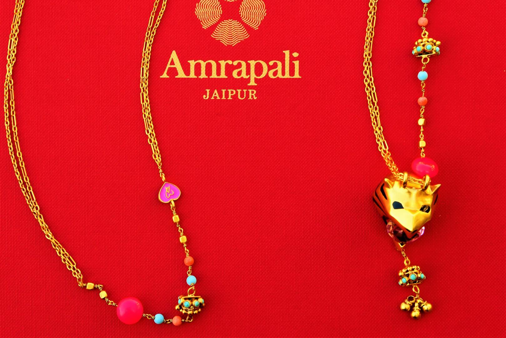Buy gold plated Amrapali metal necklace online in USA at Pure Elegance. Our fashion store brings an exquisite collection of Indian fashion jewelry in USA for women.-closeup