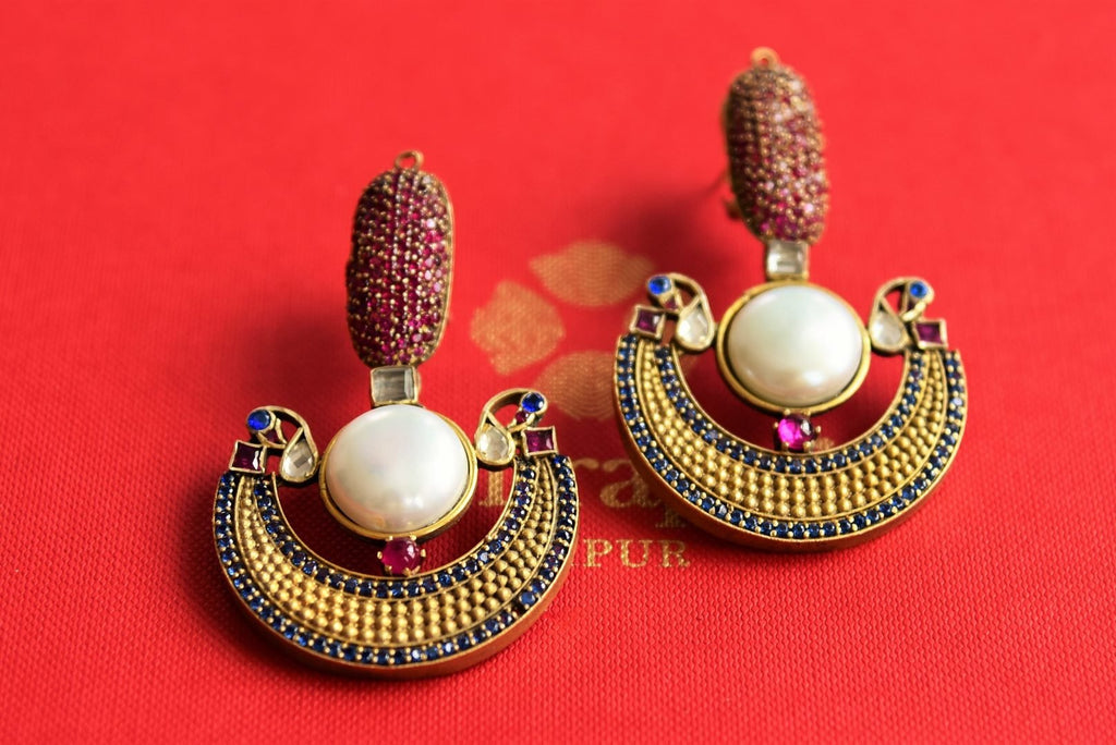 Buy Amrapali silver gold plated colored glass and pearl earrings online in USA. Pure Elegance fashion store brings an alluring range of Indian earrings in USA for women.-closeup