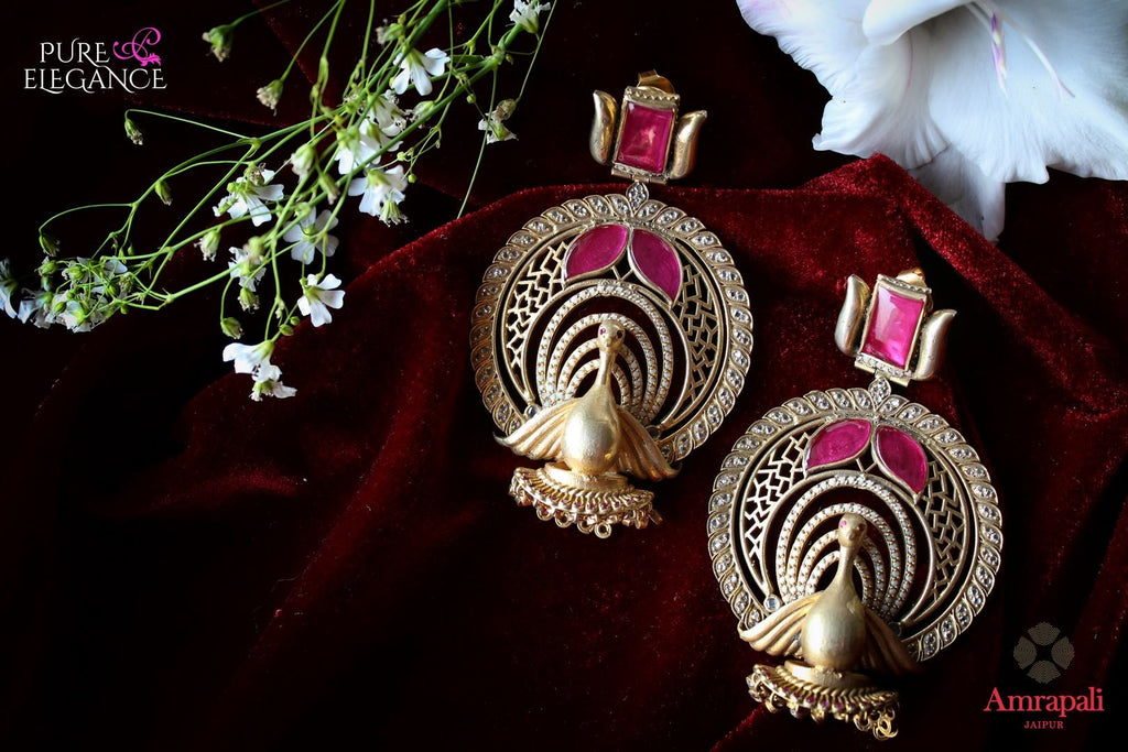 Buy Silver Gold Plated Pink White Peacock Earrings online in USA from Amrapali.  If you are looking for Indian silver earrings in USA, then Pure Elegance Indian fashion store is the place for you. A whole range of exquisite of ethnic Indian jewelry is waiting for you on our shelves, you can also opt to shop online.-flat lay