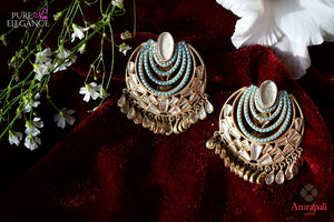 Buy Silver Gold Plated Glass Blue Zircon Earrings online in USA from Amrapali.  If you are looking for Indian silver earrings in USA, then Pure Elegance Indian fashion store is the place for you. A whole range of exquisite of ethnic Indian jewelry is waiting for you on our shelves, you can also opt to shop online.-flat lay