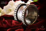 Buy beautiful Amrapali handcrafted heavy silver bangle online in USA. Find an exquisite collection of handcrafted silver gold plated jewelry in USA at Pure Elegance Indian fashion store. Complete your festive look with traditional Indian jewelry, silver gold plated earrings, silver jewellery from our online store.-flatlay