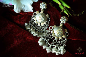 Shop silver handcrafted tribal earrings with tassels online in USA. Find an exquisite collection of handcrafted Indian jewelry in USA at Pure Elegance Indian fashion store. Complete your festive look with beautiful silver gold plated necklaces, silver gold plated earrings, silver jewelry from our online store.-flatlay