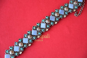 Buy Amrapali geometric design silver necklace online in USA with embedded blue stones. Add spark to your ethnic attires with beautiful Indian silver jewelry, wedding jewelry, silver gold plated necklaces from Pure Elegance Indian fashion store in USA.-flatlay
