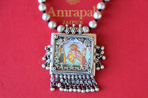 Buy Amrapali beaded silver necklace online in USA with Lord Ganesha painting pendant. Add spark to your ethnic attires with beautiful Indian silver jewelry, wedding jewelry, silver gold plated necklaces from Pure Elegance Indian fashion store in USA.-flatlay