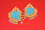 Buy silver gold plated Amrapali pearl earrings online in USA with engraved turquoise stone from Pure Elegance. Complete your traditional look with an exquisite collection of Indian silver gold plated jewelry, wedding jewellery, silver gold plated earrings and much more from our Indian fashion store in USA. -flatlay