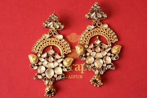 Shop Amrapali silver gold plated white glass earrings with jhumki online in USA from Pure Elegance. Complete your traditional look with an exclusive collection of Indian jewelry, silver gold plated necklaces, wedding jewellery available at our exclusive Indian fashion store in USA and also on our online store. Shop now.-flatlay