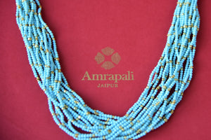 Buy Amrapali silver gold plated turquoise beads multi strings necklace online in USA. Add spark to your ethnic attires with beautiful Indian silver gold plated jewelry, wedding jewellery, silver necklaces from Pure Elegance Indian fashion store in USA.-flatlay