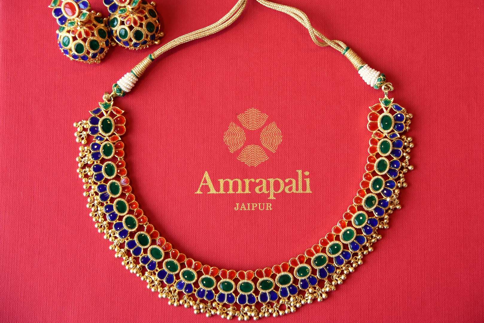 Shop Amrapali silver gold-plated multicolored glass necklace set online in USA from Pure Elegance. Complete your traditional look with an exclusive collection of Indian traditional jewelry, silver gold plated necklaces, wedding jewelry available at our exclusive Indian fashion store in USA and also on our online store. Shop now.-flatlay