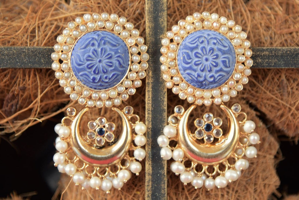 Shop beautiful Amrapali gold plated earrings online in USA with engraved blue stone and pearls. Enhance your ethnic style with exquisite Indian jewelry from Pure Elegance Indian fashion store in USA. Pick from a range of stunning silver gold plated earrings, silver gold plated necklaces, silver jewelry for a perfect...-front