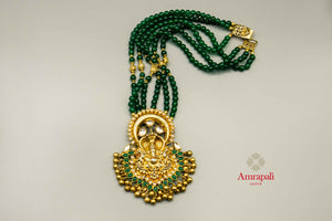 Buy Amrapali silver gold plated green string Ganesha pendant necklace online in USA. Raise your traditional fashion quotient on special occasions with exquisite Indian jewelry from Pure Elegance Indian clothing store in USA. Enhance your look with silver gold plated jewelry, fashion jewelry available online.-flatlay