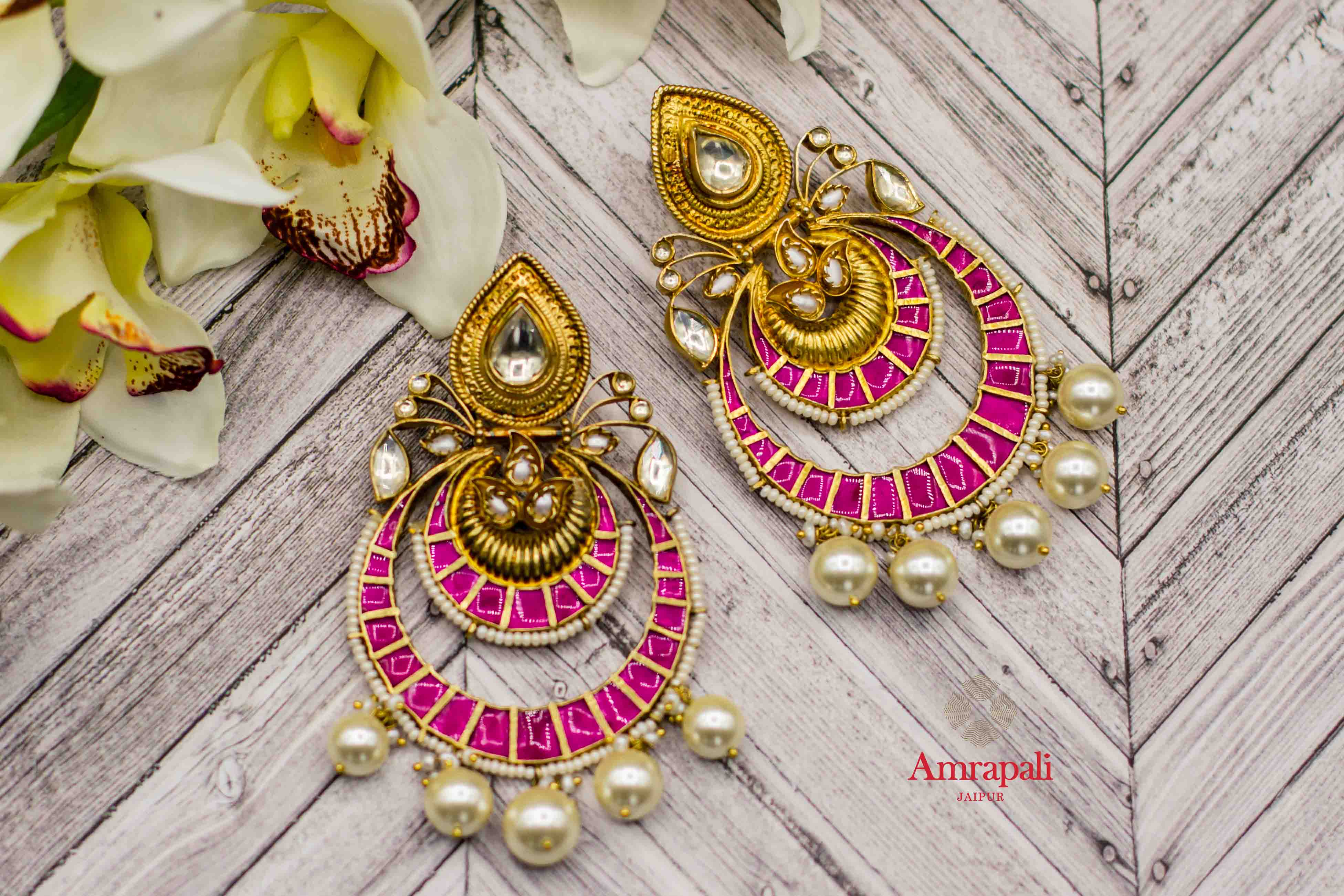 Buy Amrapali silver gold plated glass pearl chandbali earrings online in USA. Complete your ethnic look with traditional Indian silver gold plated jewelry from Pure Elegance Indian fashion store in USA. Shop gold plated necklaces, wedding jewelry for Indian brides in USA from our online store.-flatlay