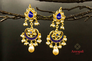 Buy Amrapali silver gold plated glass and blue stone earrings online in USA. Raise your traditional fashion quotient on special occasions with exquisite Indian jewelry from Pure Elegance Indian clothing store in USA. Enhance your look with silver gold plated jewelry, fashion jewelry available online.-front
