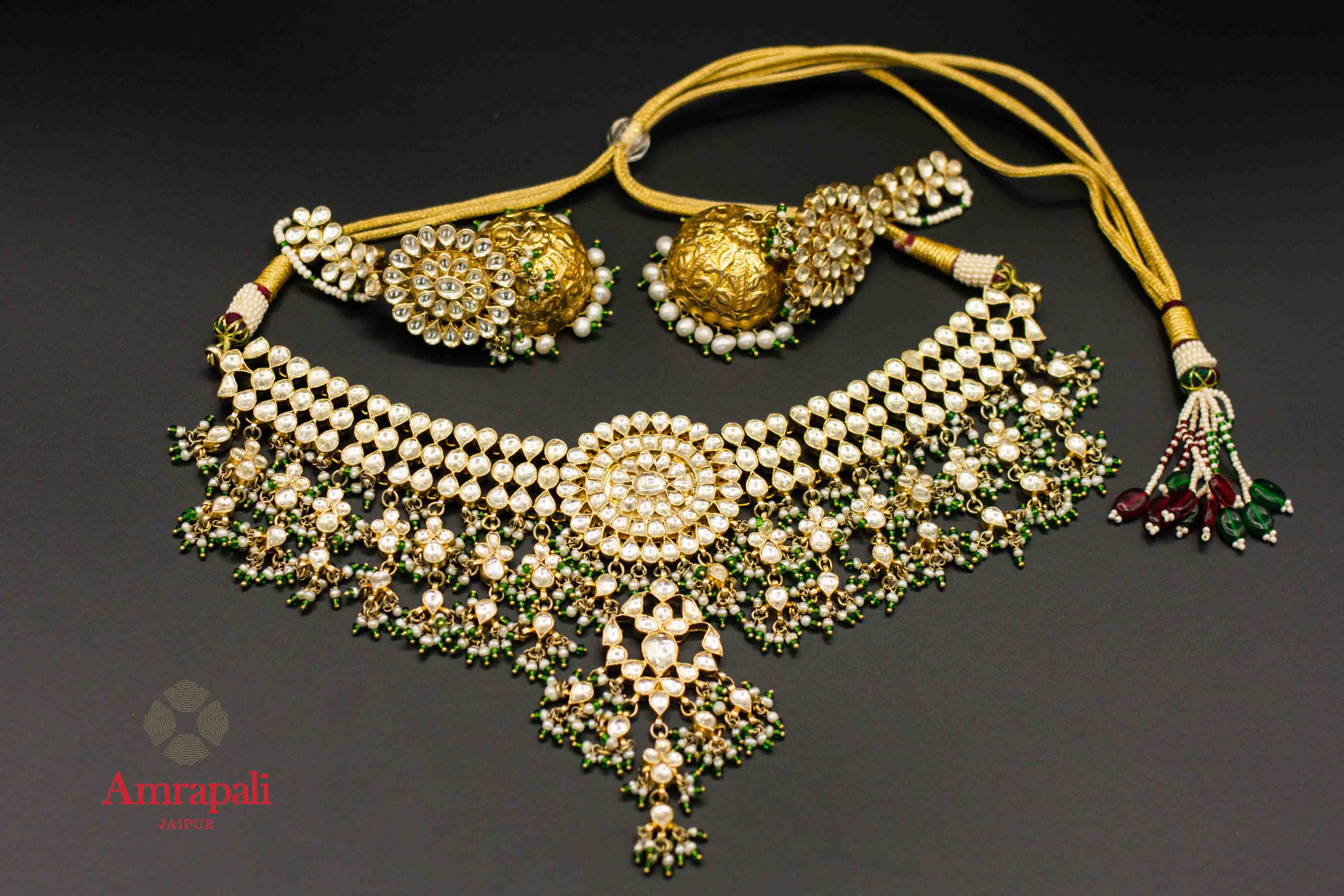 Shop silver gold plated kundan Amrapali necklace set online in USA with jhumki. Raise your ethnic style quotient on special occasions with exquisite Indian jewelry from Pure Elegance Indian clothing store in USA. Enhance your Indian look with silver gold plated jewelry, necklaces, silver jewelry available online.-flatlay