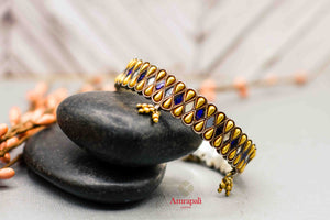 Shop Amrapali silver gold plated blue glass leaf design bangle online in USA. Complete your ethnic look with traditional Indian silver gold plated jewelry from Pure Elegance Indian fashion store in USA. Shop gold plated necklaces, wedding jewelry for Indian brides in USA from our online store.-front