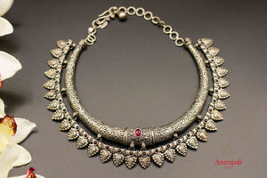 Buy Amrapali oxidized silver hasli necklace online in USA with stones. Raise your ethnic style quotient on special occasions with exquisite Indian jewelry from Pure Elegance Indian clothing store in USA. Enhance your Indian look with silver gold plated jewelry, necklaces, silver jewelry available online.-flatlay