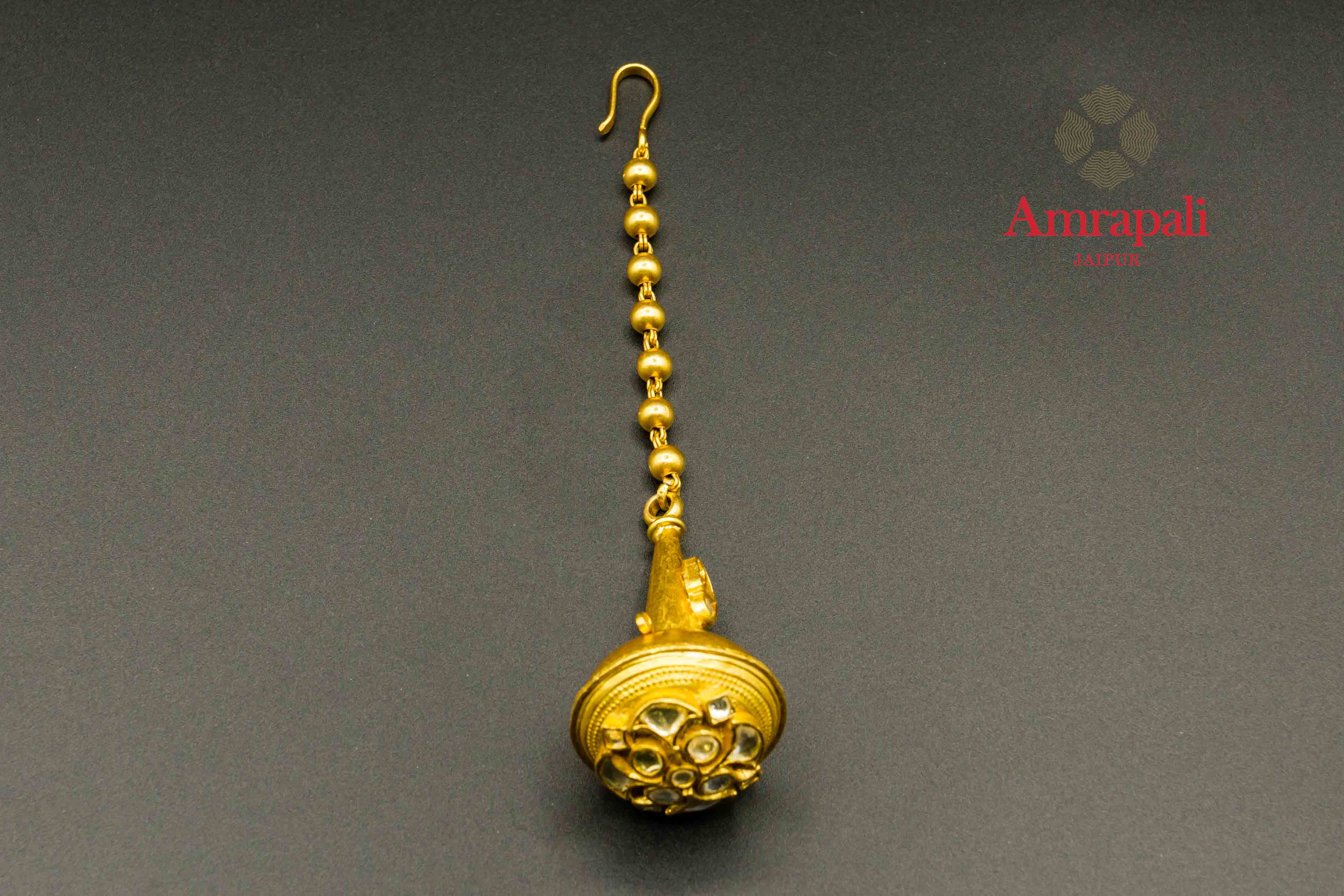 Buy Amrapali silver gold plated traditional borla maang tikka online in USA. Raise your traditional fashion quotient on special occasions with exquisite Indian jewelry from Pure Elegance Indian clothing store in USA. Enhance your look with silver gold plated jewelry, fashion jewelry available online.-flatlay