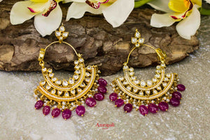 Buy silver gold plated kundan bali earrings online in USA with red stones. Complete your ethnic look with traditional Indian silver gold plated jewelry from Pure Elegance Indian fashion store in USA. Shop gold plated necklaces, wedding jewelry for Indian brides in USA from our online store.-flatlay