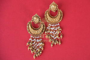 Buy silver gold plated Amrapali engraved earrings online in USA with pearl tassels. Enhance your ethnic style with exquisite Indian jewelry from Pure Elegance Indian fashion store in USA. Pick from a range of stunning silver gold plated earrings, silver gold plated necklaces, silver jewelry for a perfect finishing...-front