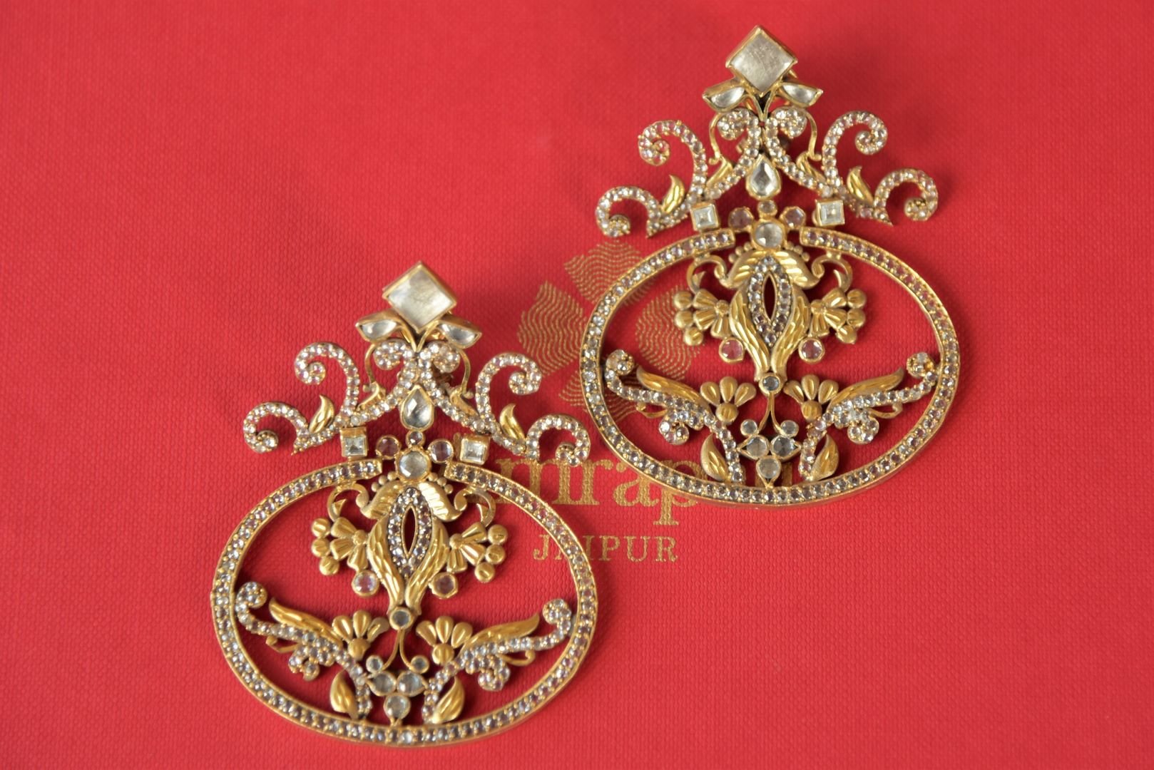 Shop Amrapali silver gold plated glass and zircon earrings online in USA. Enhance your ethnic style with exquisite Indian jewelry from Pure Elegance Indian fashion store in USA. Pick from a range of stunning silver gold plated earrings, silver gold plated necklaces, silver jewelry for a perfect touch to your ethnic sty-front