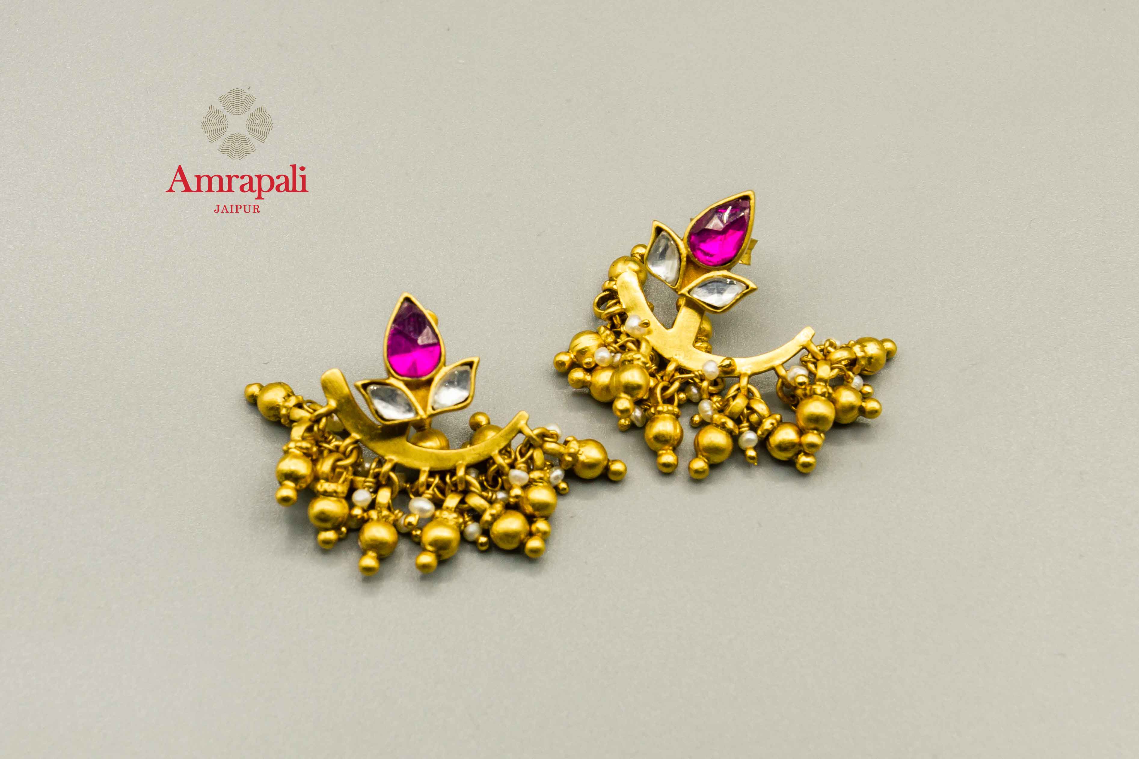 Buy Amrapali silver gold plated glass leaf design earrings online in USA with golden beads. Raise your traditional fashion quotient on special occasions with exquisite Indian jewelry from Pure Elegance Indian clothing store in USA. Enhance your look with silver gold plated jewelry, silver jewellery available online.-flatlay