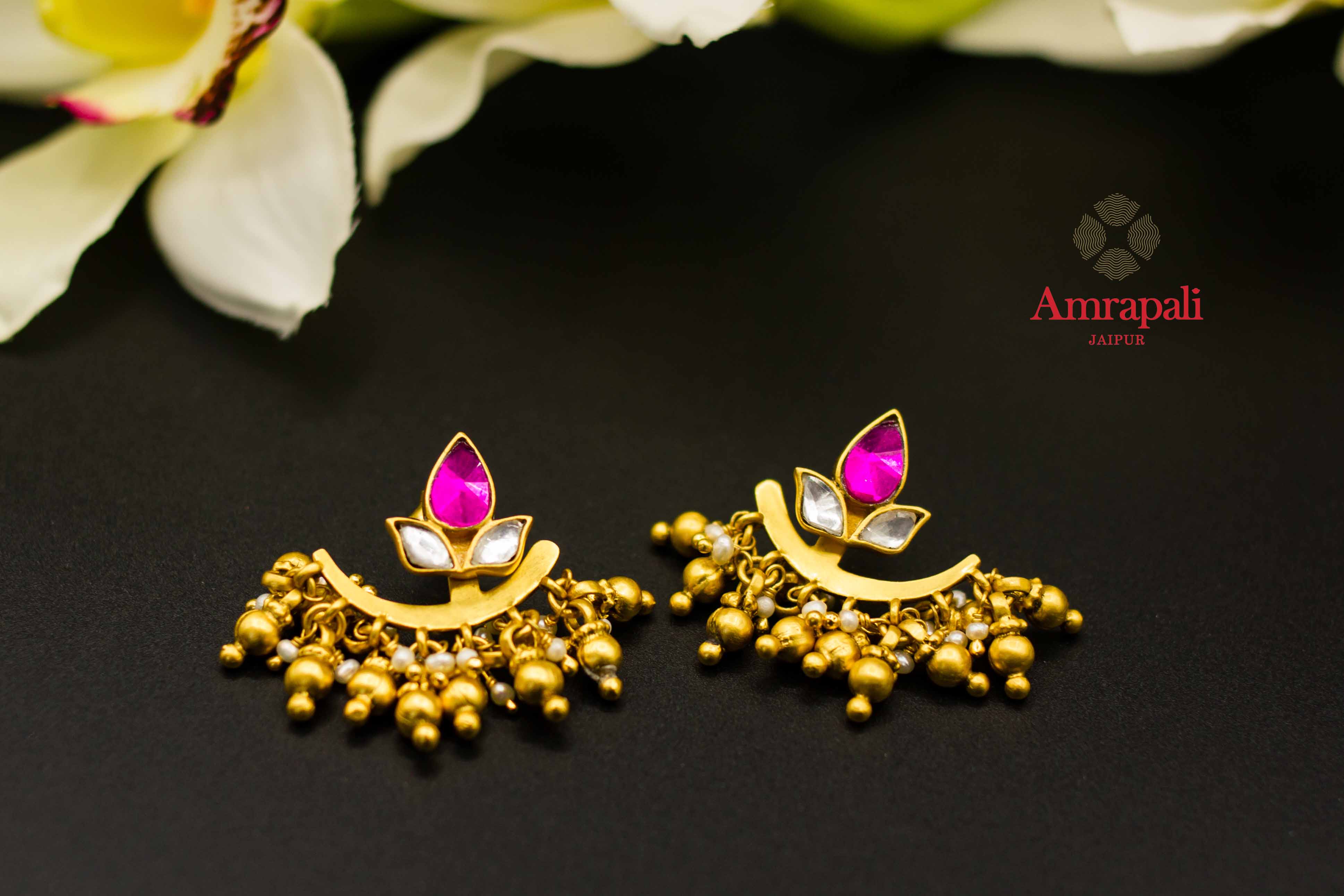 Buy Amrapali silver gold plated glass earrings online in USA with golden beads. Raise your ethnic style quotient on special occasions with exquisite Indian jewelry from Pure Elegance Indian clothing store in USA. Enhance your Indian look with silver gold plated jewelry, necklaces, fashion jewelry available online.-flatlay