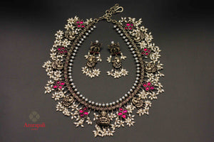 Shop Amrapali glass and pearl guttapoosalu silver necklace online in USA. Raise your ethnic style quotient on special occasions with exquisite Indian jewelry from Pure Elegance Indian clothing store in USA. Enhance your Indian look with silver gold plated jewelry, necklaces, fashion jewelry available online.-flatlay