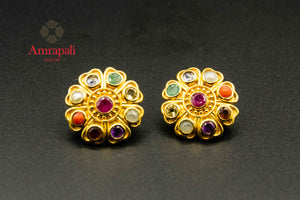 Buy Amrapali silver gold plated floral navratna studs online in USA. Raise your traditional fashion quotient on special occasions with exquisite Indian jewelry from Pure Elegance Indian clothing store in USA. Enhance your look with silver gold plated jewelry, wedding jewellery available online.-flatlay