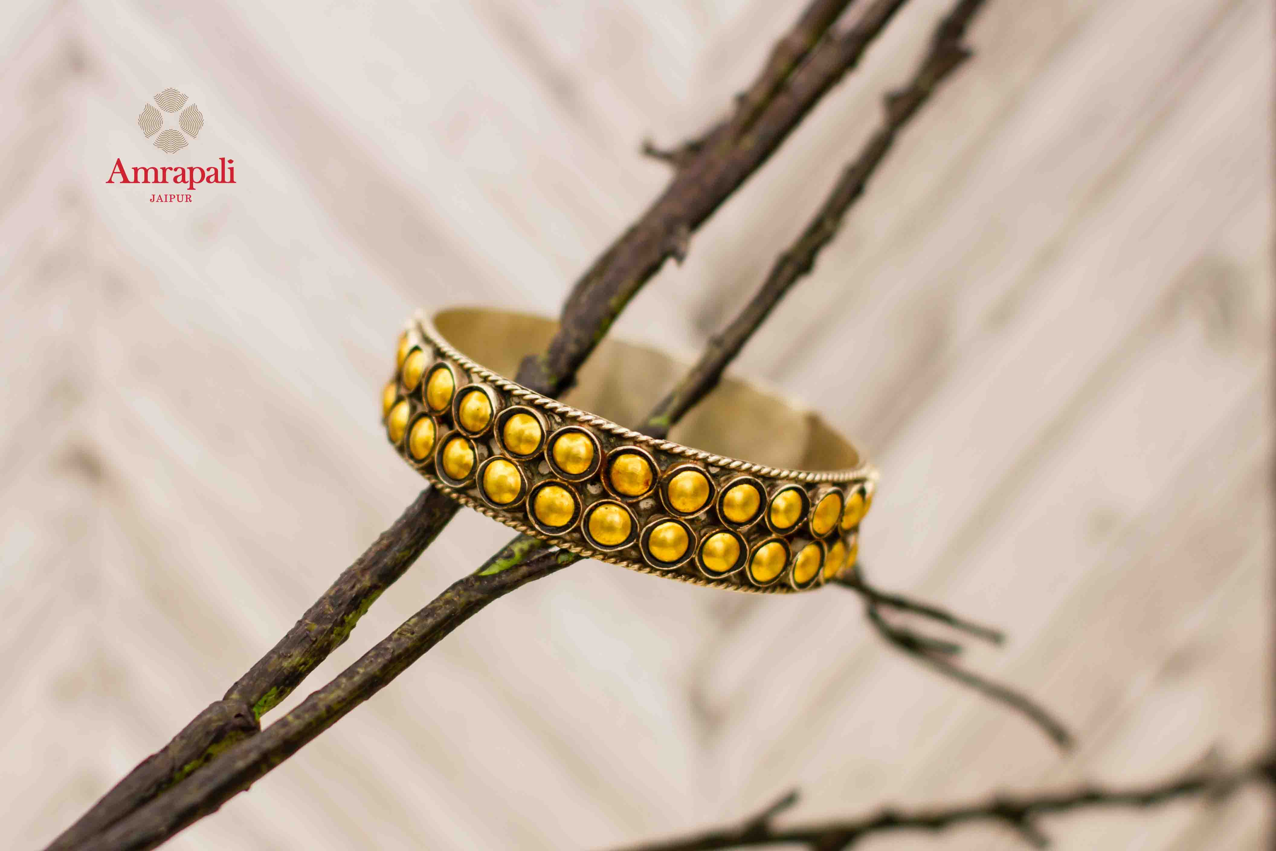 Shop Amrapali silver gold plated two-tone bangle online in USA. Complete your ethnic look with traditional Indian jewelry from Pure Elegance Indian fashion store in USA. Shop silver jewelry, wedding jewelry for Indian brides in USA from our online store.-front