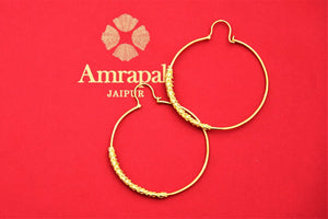 Shop Amrapali elegant silver gold plated hoop earrings online in USA. Choose from a beautiful range of Indian jewellery, silver jewelry, silver earrings, gold plated jewelry from Pure Elegance Indian fashion store in USA.-flatlay