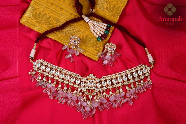 Shop stunning Amrapali silver gold plated stone necklace set online in USA. Enhance your ethnic attires with exquisite Amrapali silver gold plated jewelry, silver gold plated necklace from Pure Elegance Indian fashion store in USA.-flatlay
