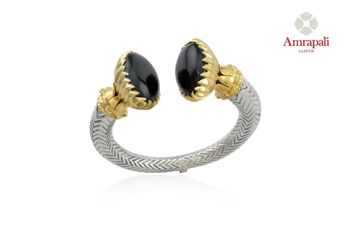 Buy attractive silver gold plated two-tone black stone bracelet online in USA. Enhance your ethnic attires with exquisite Amrapali silver gold plated jewelry, silver gold plated necklace from Pure Elegance Indian fashion store in USA.-front