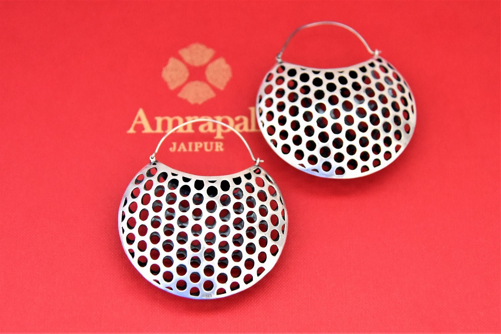 Buy elegant Amrapali silver basket earrings online in USA. Choose from a beautiful range of Indian jewelry, silver jewelry, silver earrings, gold plated jewelry from Pure Elegance Indian fashion store in USA.-flatlay