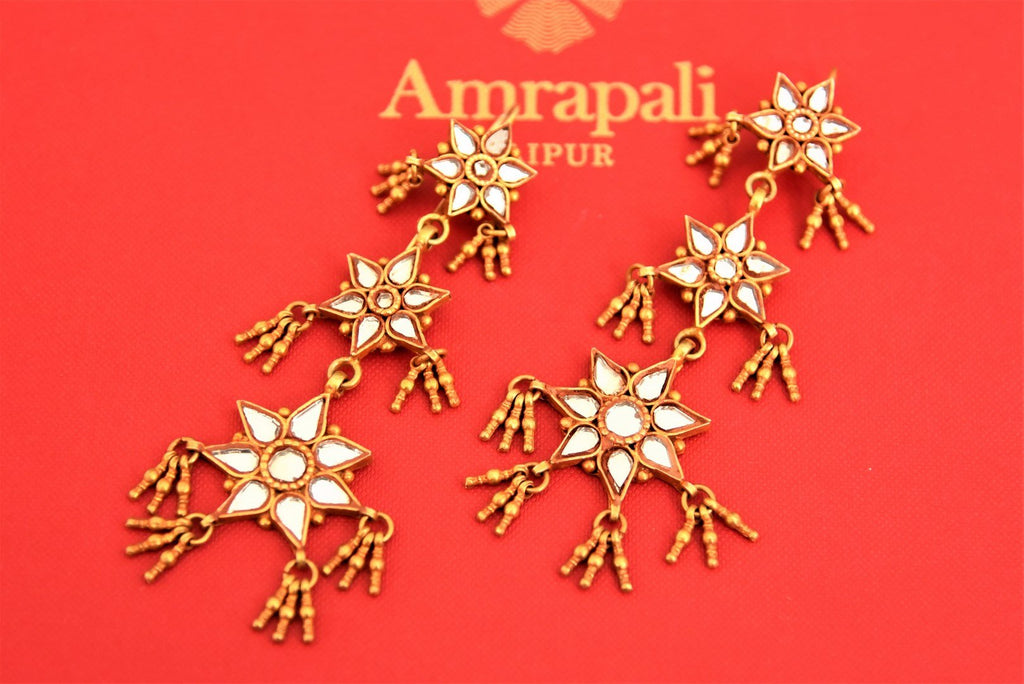 Buy stunning Amrapali silver gold plated glass flower motifs drop earrings online in USA. Choose from a beautiful range of Indian jewelry, silver necklaces, silver earrings, gold plated jewelry from Pure Elegance Indian fashion store in USA.-flatlay