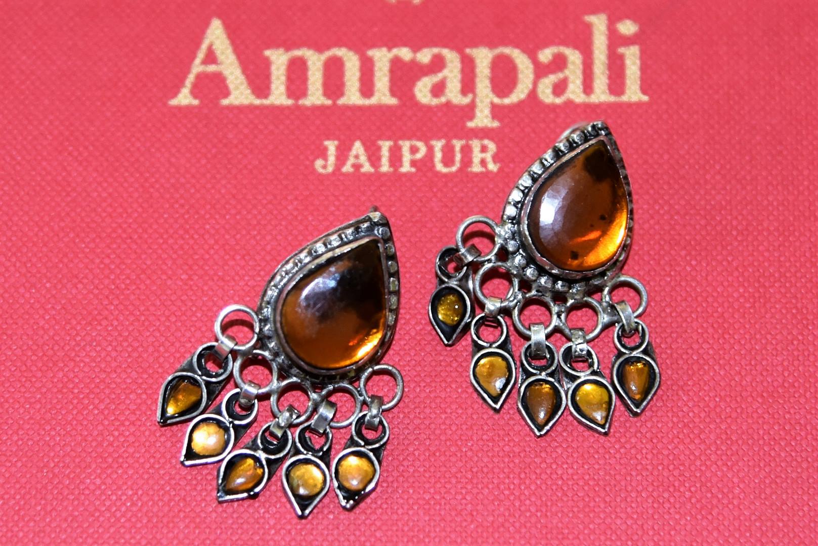 Shop gorgeous Amrapali yellow glass leaf silver earrings online in USA. Complete your festive look with exclusive silver gold plated jewelry, gold plated earrings, silver jewelry, silver earrings from Pure Elegance Indian fashion store in USA.-front