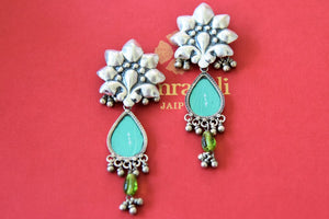 Buy stunning Amrapali blue stone silver flower top earrings online in USA. Complete your festive look with exclusive silver gold plated jewelry, gold plated earrings, silver jewelry, silver earrings from Pure Elegance Indian fashion store in USA.-front