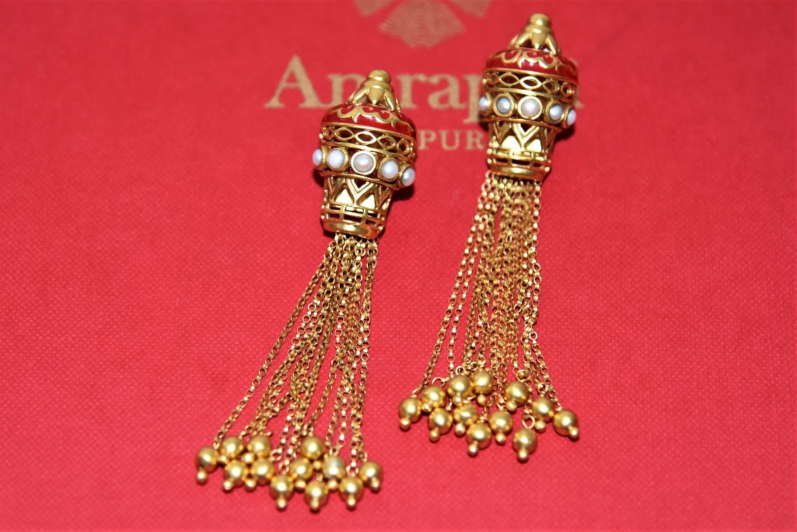 Buy stunning Amrapali silver gold plated tassel earrings online in USA with pearl and enamel top. Complete your festive look with exclusive silver gold plated jewelry, gold plated earrings, silver jewelry, silver earrings from Pure Elegance Indian fashion store in USA.-front