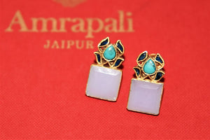 Shop stunning Amrapali silver gold plated stone earrings online in USA. Complete your festive look with exclusive silver gold plated jewelry, gold plated earrings, silver jewelry, silver earrings from Pure Elegance Indian fashion store in USA.-flatlay