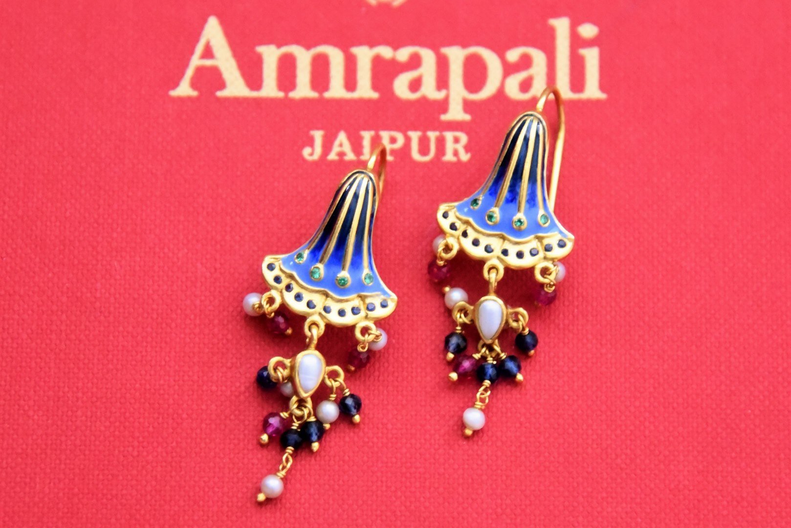 Shop stunning Amrapali blue enamel gold plated blue bell earrings online in USA. Shop beautiful Amrapali jewelry, silver jewelry, gold plated jewelry, silver choker necklaces, gold plated necklace in USA from Pure Elegance Indian fashion store in USA.-full view
