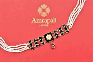 Buy Amrapali black stones choker necklace online in USA with pearl strings. Shop beautiful Amrapali jewelry, gold plated necklaces, silver jewelry, wedding jewelry, gold plated earrings from Pure Elegance Indian fashion store in USA.-front