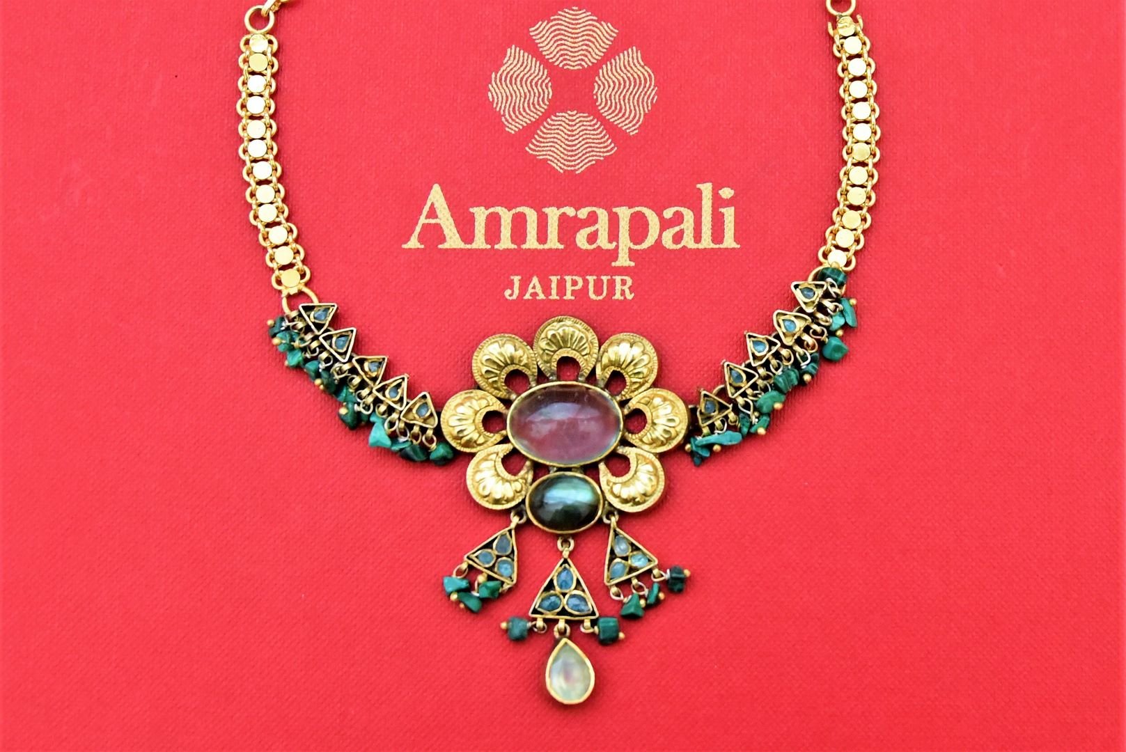 Shop beautiful gold plated green stones floral pendant necklace online in USA. Shop beautiful Amrapali jewelry, gold plated necklaces, silver jewelry, wedding jewelry, gold plated earrings from Pure Elegance Indian fashion store in USA.-front