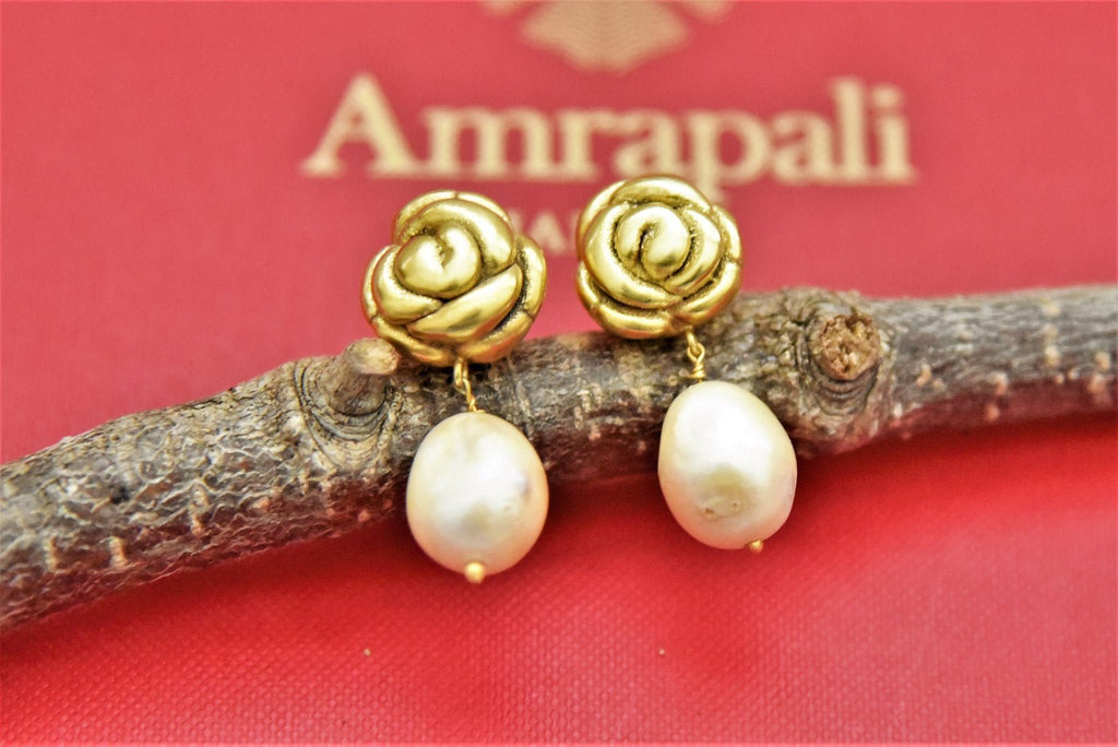 Shop stunning gold plated rose studs online in USA with pearl drop. Shop beautiful Amrapali jewelry, gold plated necklaces, silver jewelry, wedding jewelry, gold plated earrings from Pure Elegance Indian fashion store in USA.-front