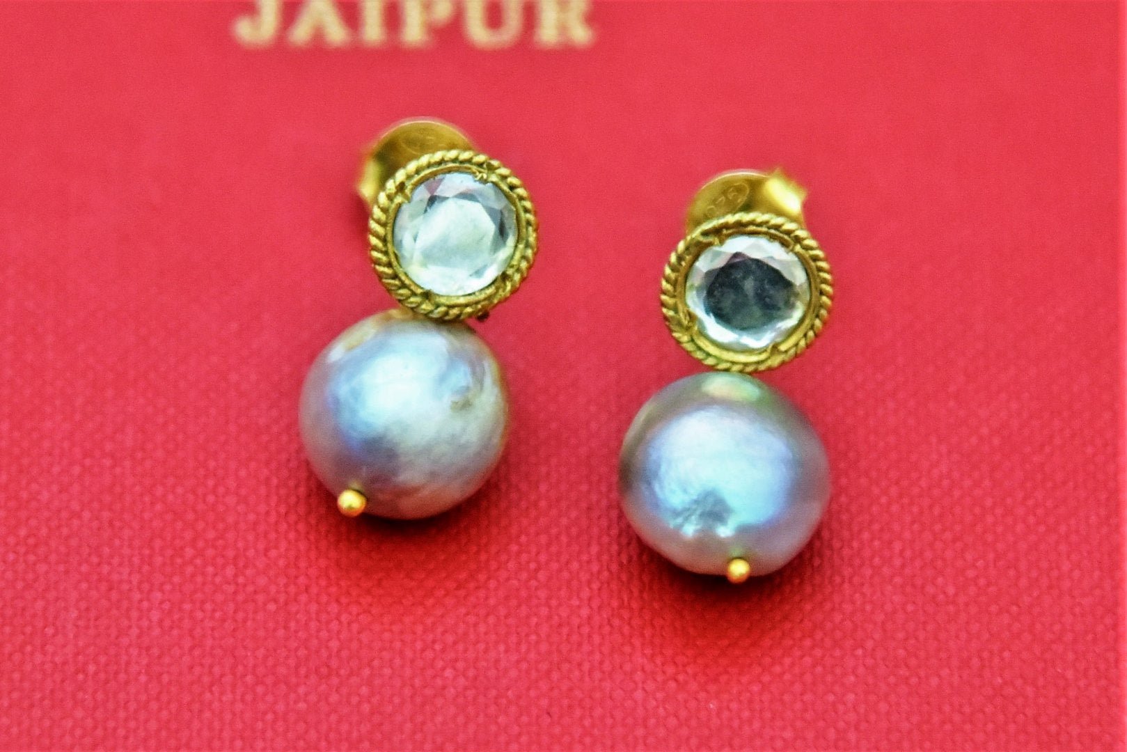Buy stunning gold plated glass and pearl drop earrings online in USA. Shop beautiful Amrapali jewelry, gold plated necklaces, silver jewelry, wedding jewelry, gold plated earrings from Pure Elegance Indian fashion store in USA.-front