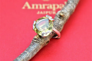 Shop stunning Amrapali silver ring online in USA with green stone. Shop beautiful Amrapali jewelry, gold plated necklaces, silver jewelry, wedding jewelry, gold plated earrings from Pure Elegance Indian fashion store in USA.-front