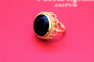 Shop stunning Amrapali gold plated ring online in USA with black stone. Shop beautiful Amrapali jewelry, gold plated necklaces, silver jewelry, wedding jewelry, gold plated earrings from Pure Elegance Indian fashion store in USA.-front