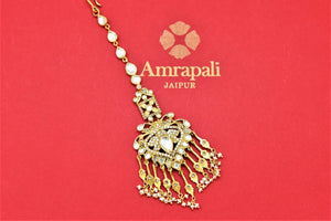 Shop stunning Amrapali gold plated glass zircon maangtikka online in USA. Shop beautiful Amrapali jewelry, gold plated necklaces, silver jewelry, wedding jewelry, gold plated earrings from Pure Elegance Indian fashion store in USA.-front