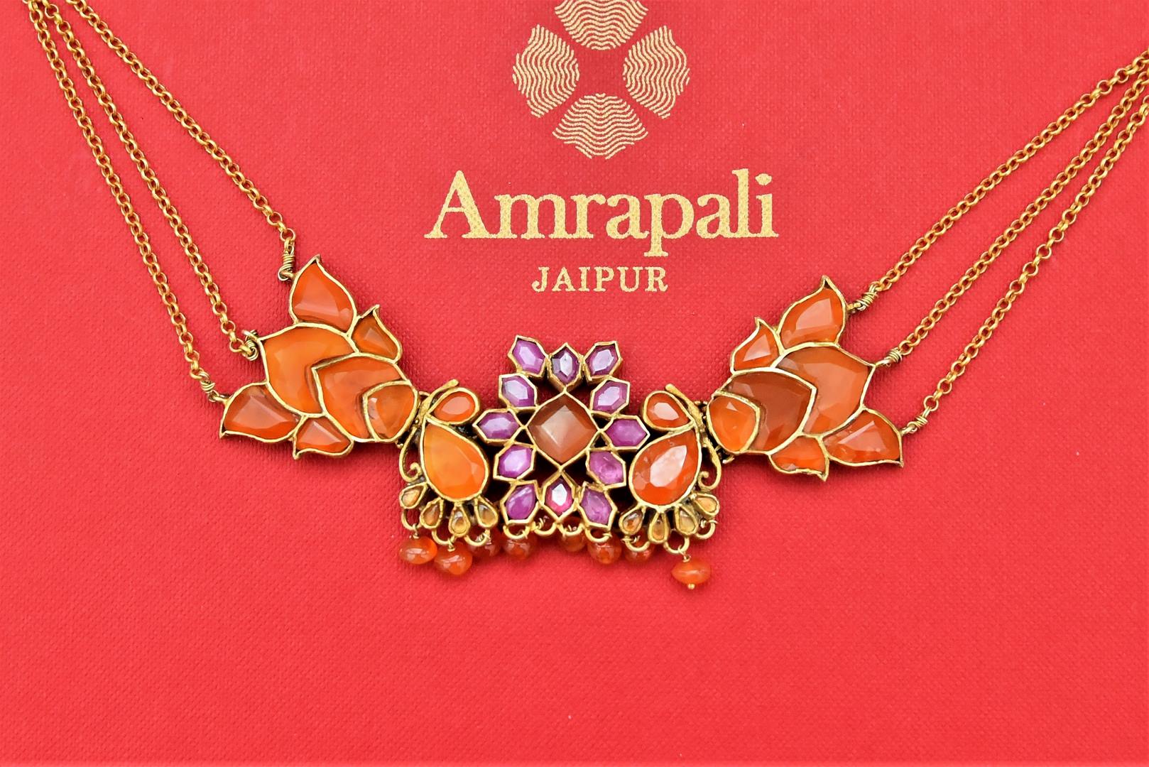 Buy stunning gold plated and orange stone floral necklace online in USA. Shop beautiful Amrapali jewelry, gold plated necklaces, silver jewelry, wedding jewelry, gold plated earrings from Pure Elegance Indian fashion store in USA.-front