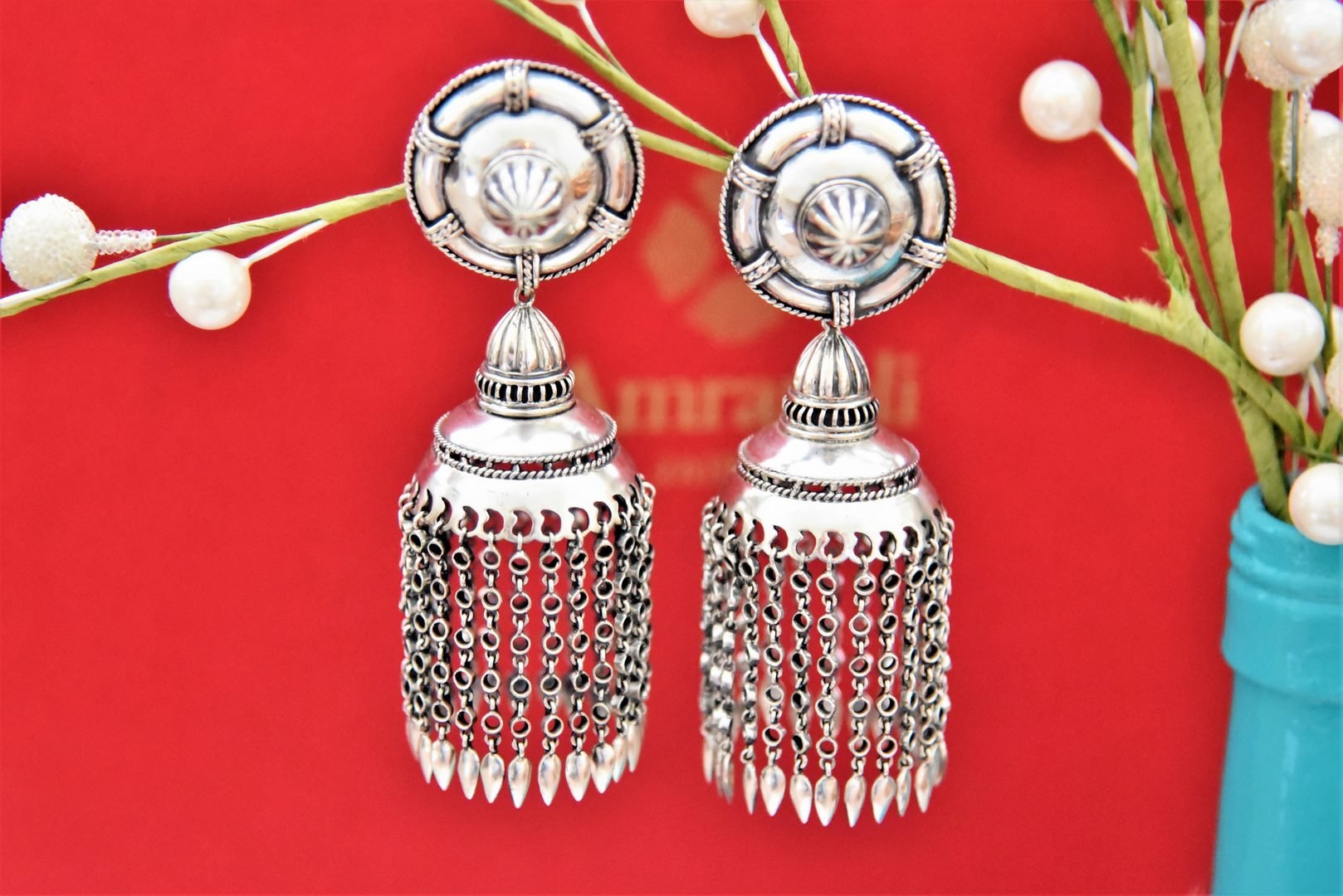Buy Amrapali silver jhumka earrings online in USA with tassels. Shop beautiful Amrapali jewelry, gold plated necklaces, silver jewelry, wedding jewelry, gold plated earrings from Pure Elegance Indian fashion store in USA.-front