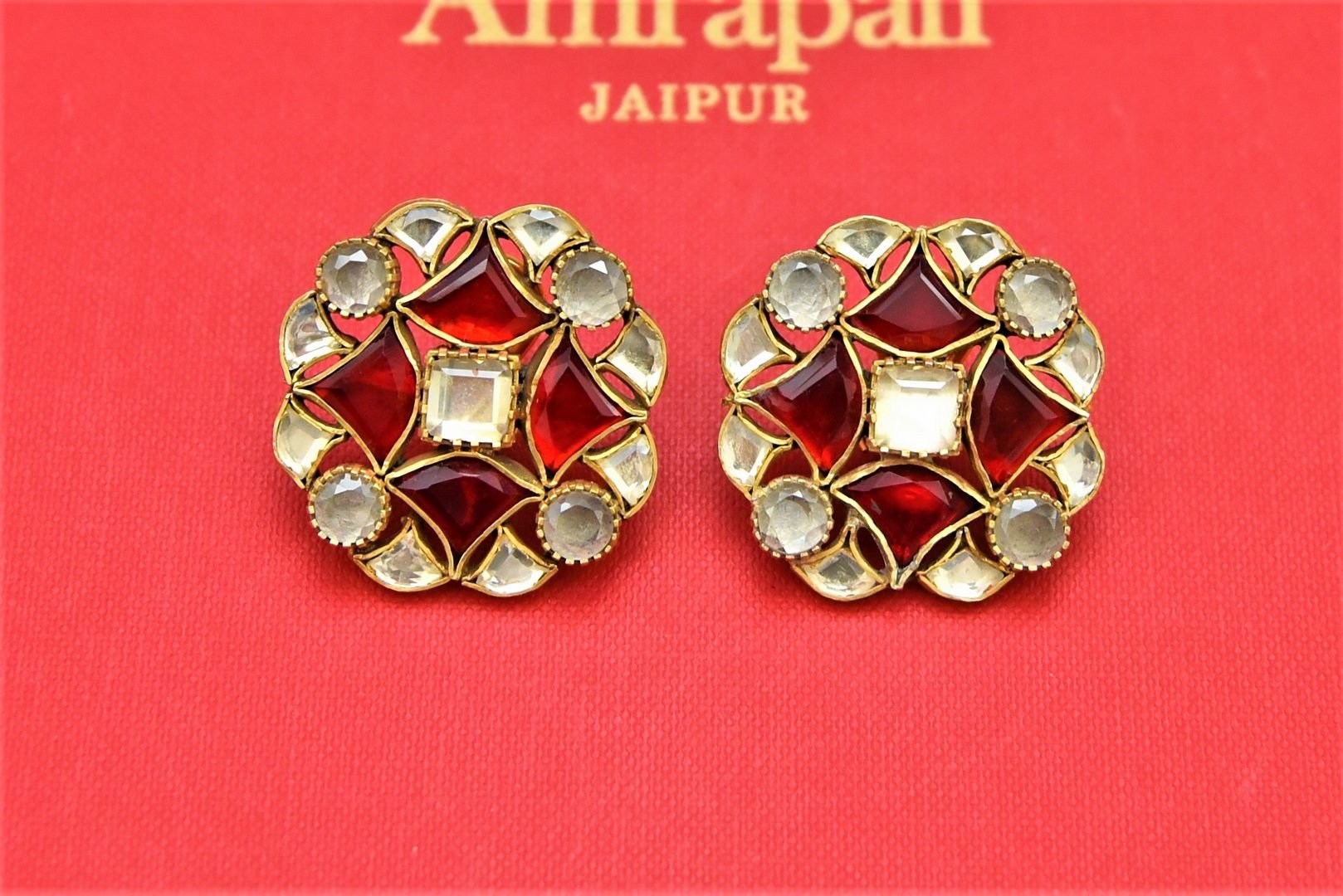 Buy stunning gold plated glass kundan stud earrings online in USA. Shop beautiful Amrapali jewelry, gold plated necklaces, silver jewelry, wedding jewelry, gold plated earrings from Pure Elegance Indian fashion store in USA.-front