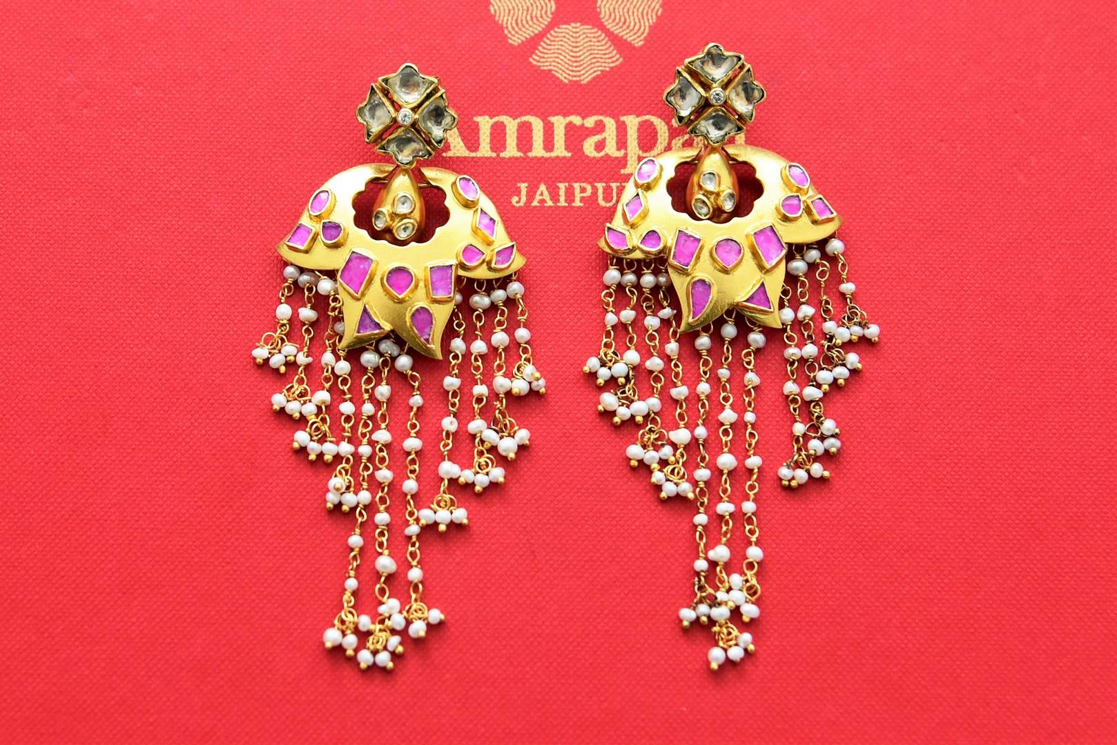 Shop stunning gold plated floral earrings online in USA with pearl strings. Shop gold plated jewelry, silver jewelry,  silver earrings, bridal jewelry, fashion jewelry from Amrapali from Pure Elegance Indian clothing store in USA.-full view