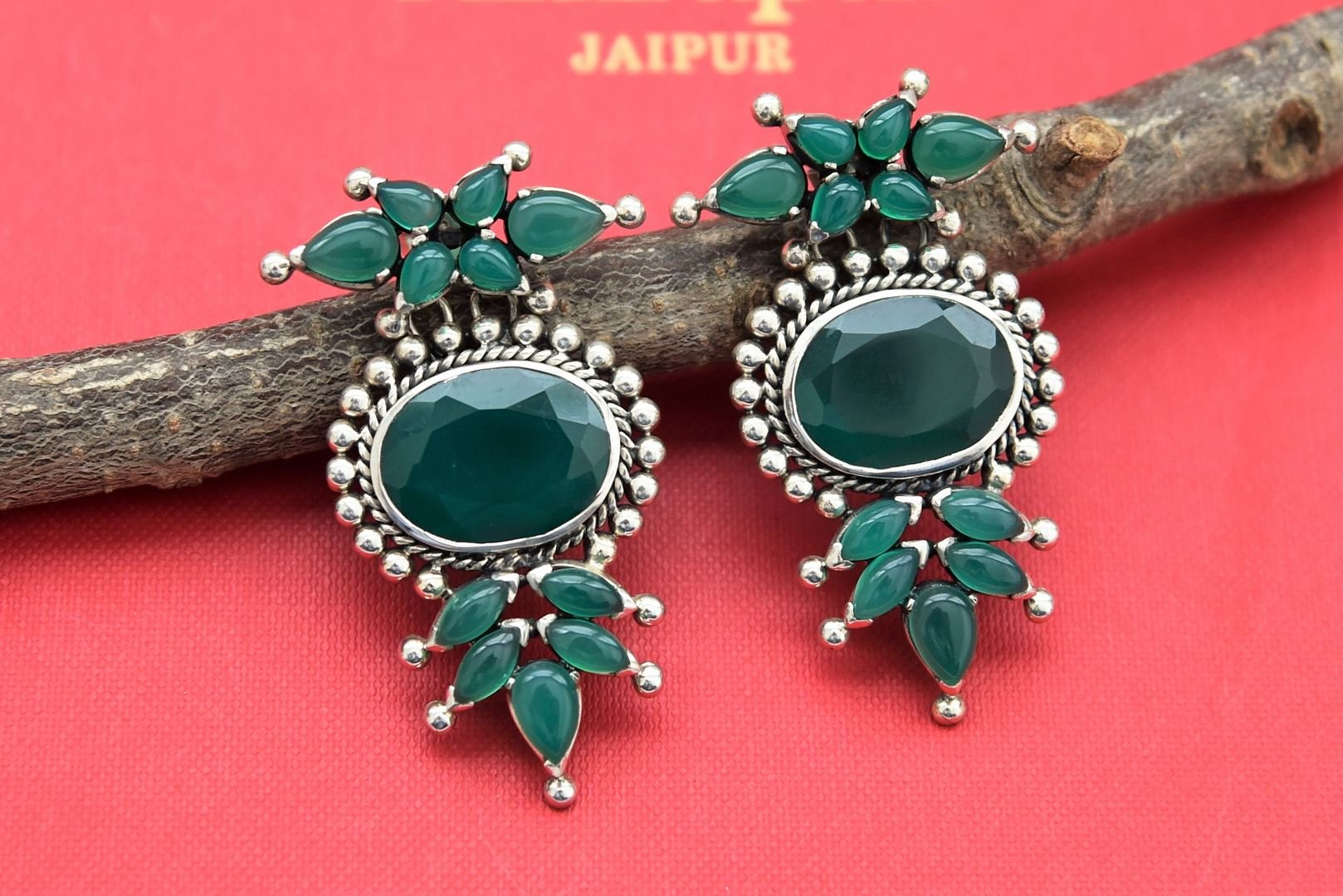 Buy stunning Amrapali green stones silver earrings online in USA. Shop gold plated jewelry, silver jewelry,  silver earrings, bridal jewelry, fashion jewelry from Amrapali from Pure Elegance Indian clothing store in USA.-full view